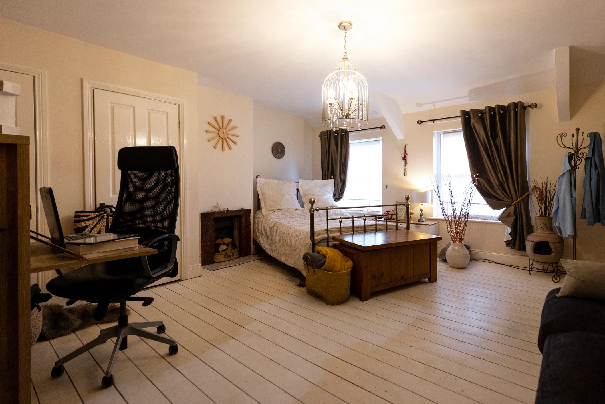 Finished decorated bedroom with warm lighting